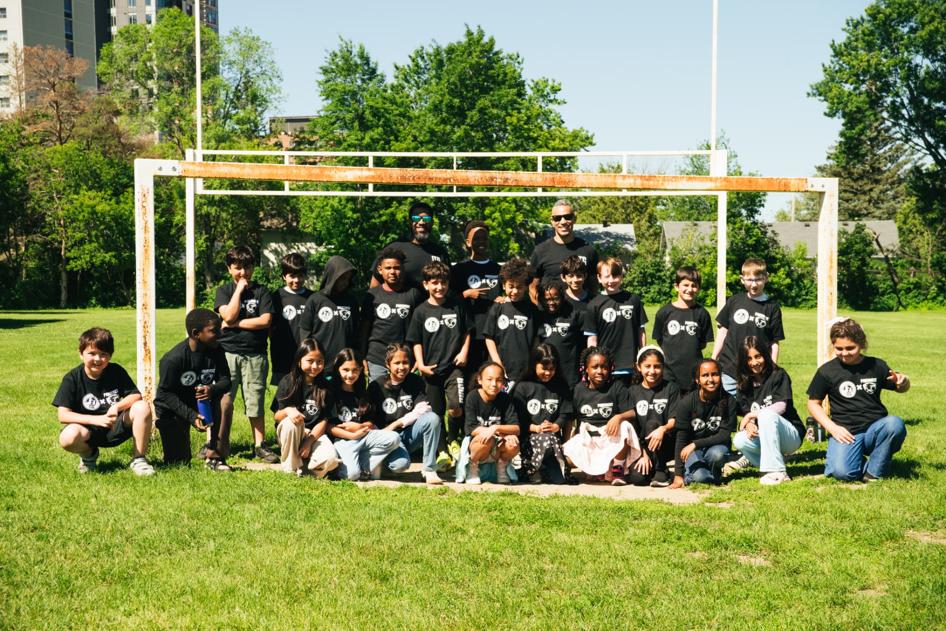 ITG youth program group photo at the soccer goal